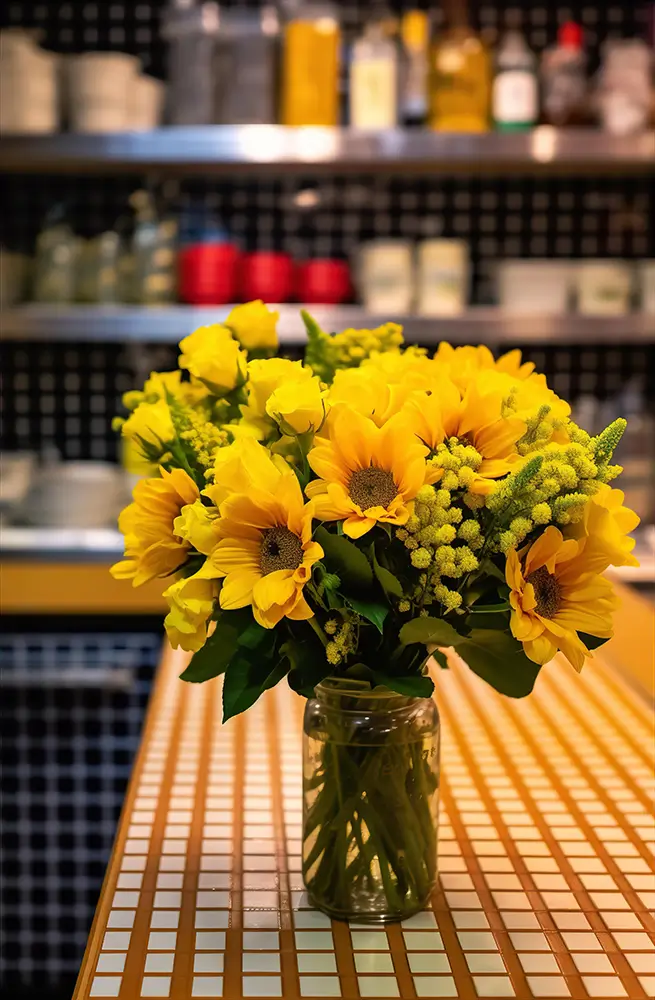 yellow-flowers-in-a-flower-arrangement-on-the-counter-in-a-store