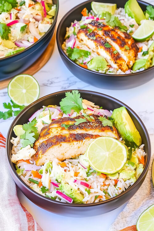 bowl-of-blackened-chicken-rice-with-lime-coleslaw-and-vibrant