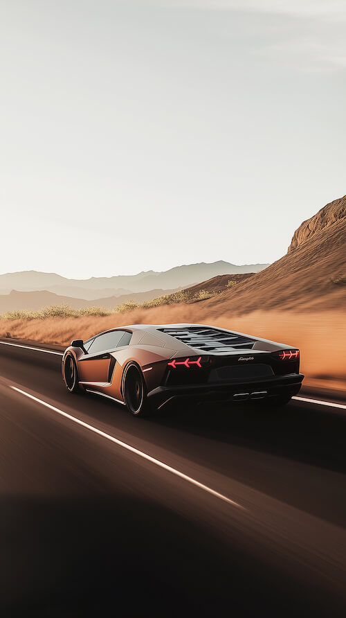 lamborghini-aventador-driving-on-the-road-in-front-of-desert