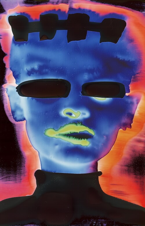 blue-alien-figure-with-black-eyes-and-an-illuminated-green-mouth