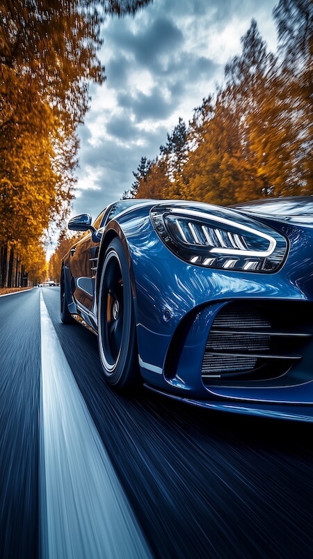blue-mercedes-amg-gt-black-series-car-driving-on-the-road