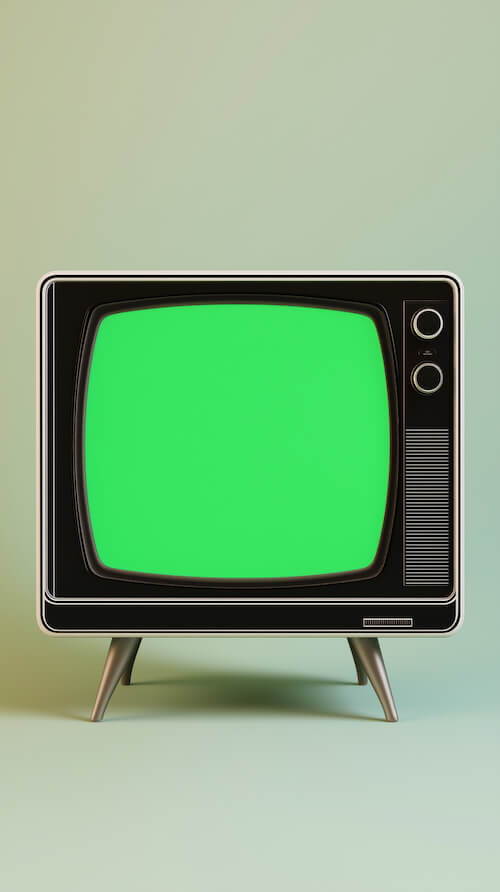 television-with-a-green-screen-set-against-a-light-background